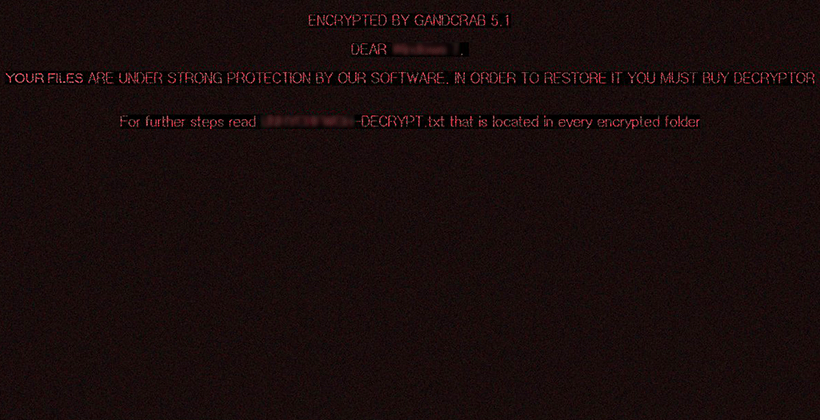 Fond d'écran défini par GandCrab 5.1 avec le message d'avertissement et une référence à une note de rançon